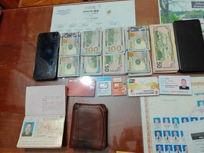 实居省2名中国男子借换汇诈骗，当场被抓！