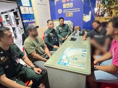 金边一群外国人店铺前发生冲突，警方介入后双方和解