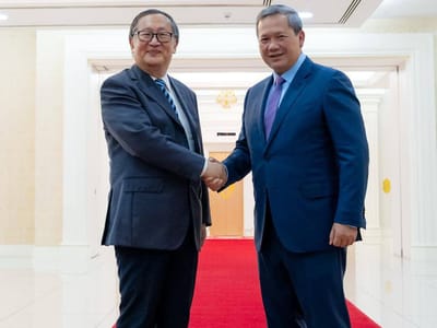 洪玛奈首相会见上海国际问题研究院学术咨询委员会主席杨洁勉