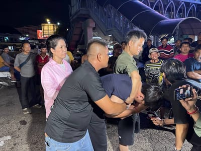 拖欠中国夫妇水果款12万美元，一名商人被扭送警局