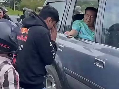 沿公路派发善款未换新车 柬埔寨低调勋爵引网友点赞