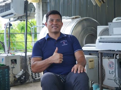从月薪180美元保安到月入2000美元老板 柬埔寨小伙靠职业技能改变命运